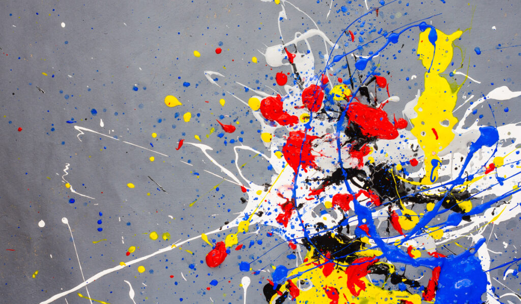 Multicolored color spill blemish on the gray background