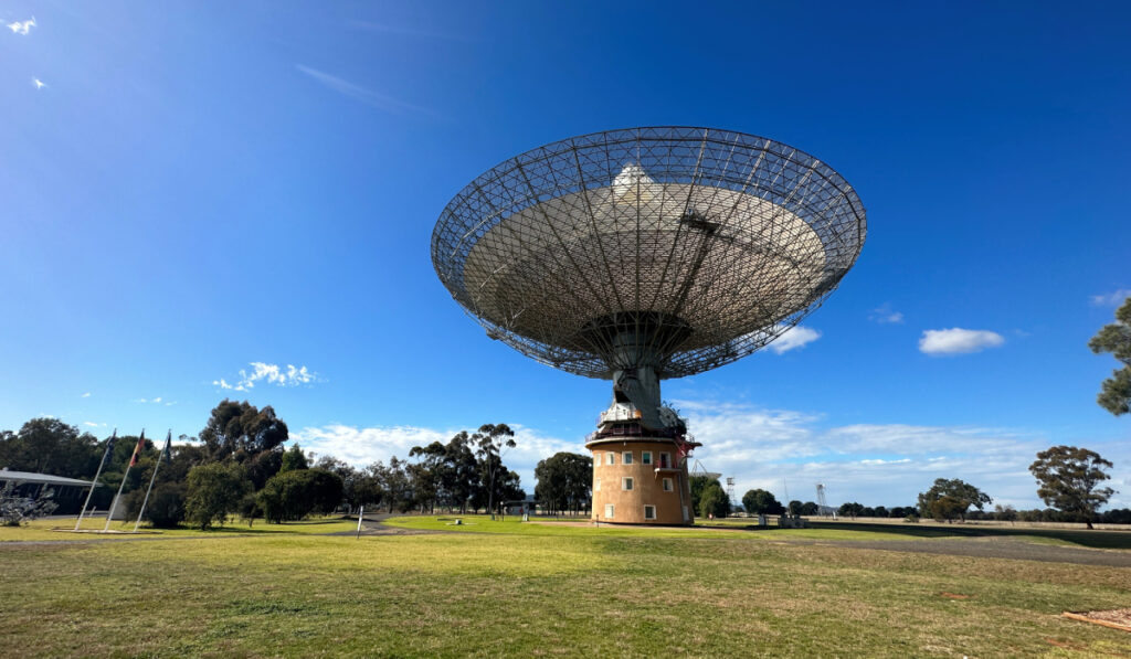 Scenic View Of Field Against Sky Radio Antenna