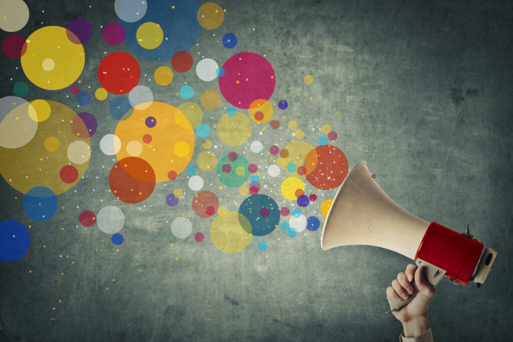Megaphone with colorful bubbles
